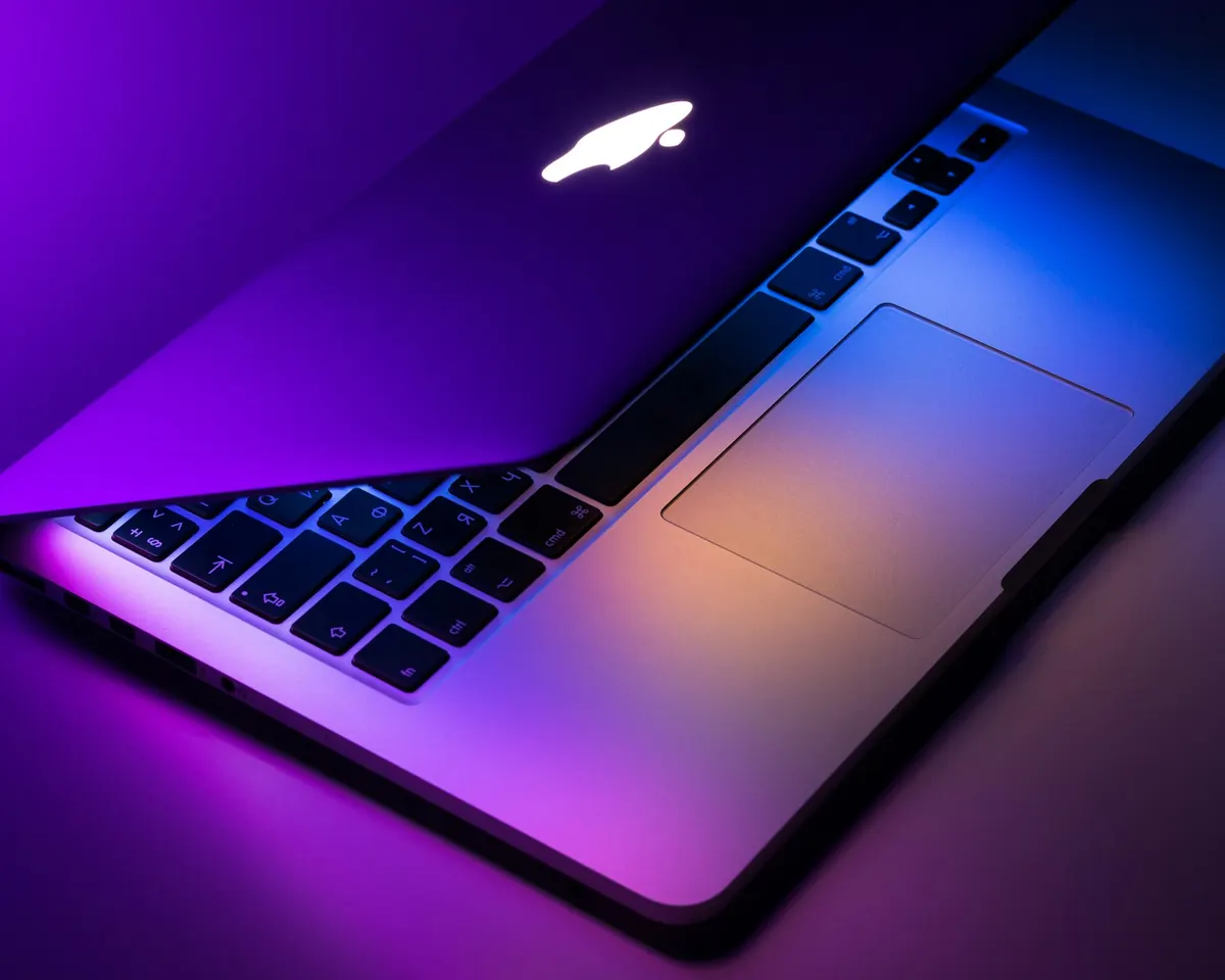 MacBook Pro running a local LoRA fine-tuning job on Apple Silicon